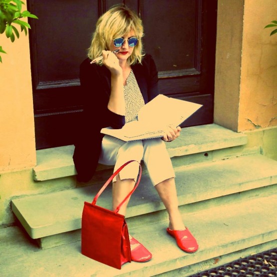 Jil Sander red bag and white pants